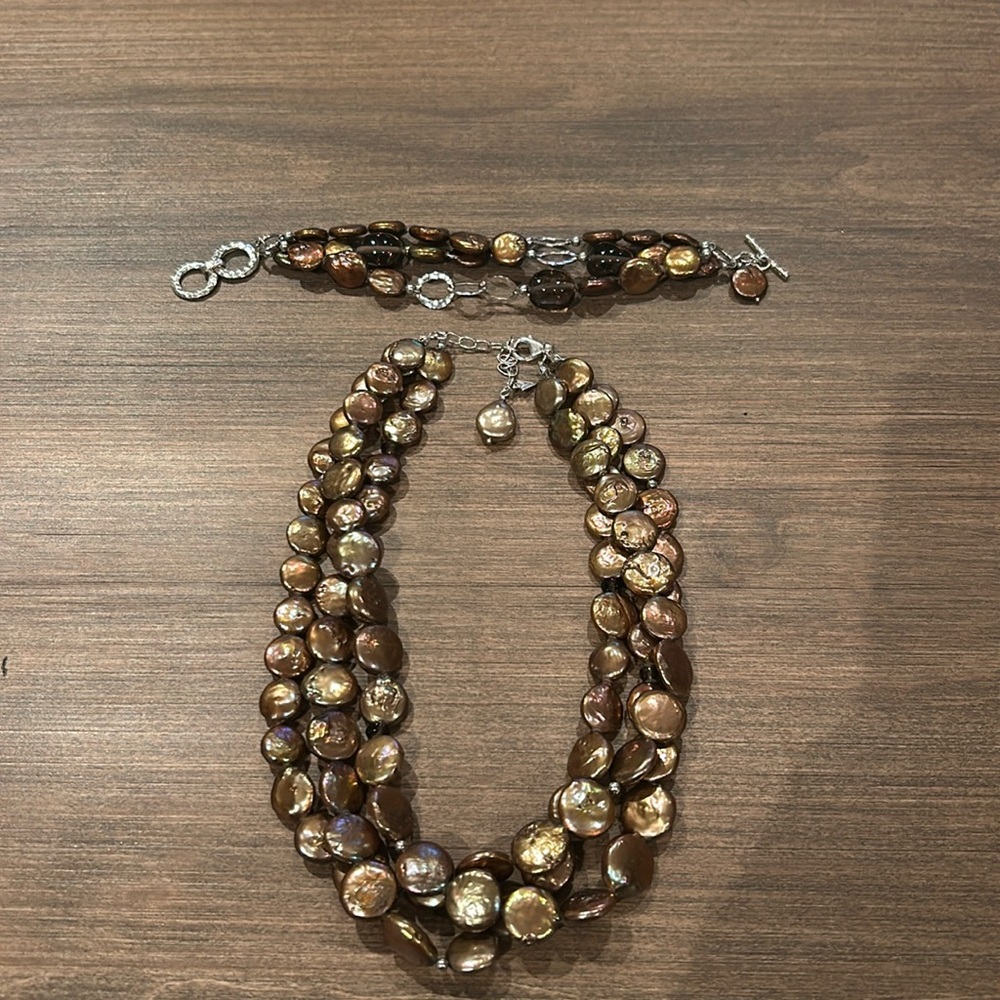 Silpada Bronze coin Necklace and bracelet set.